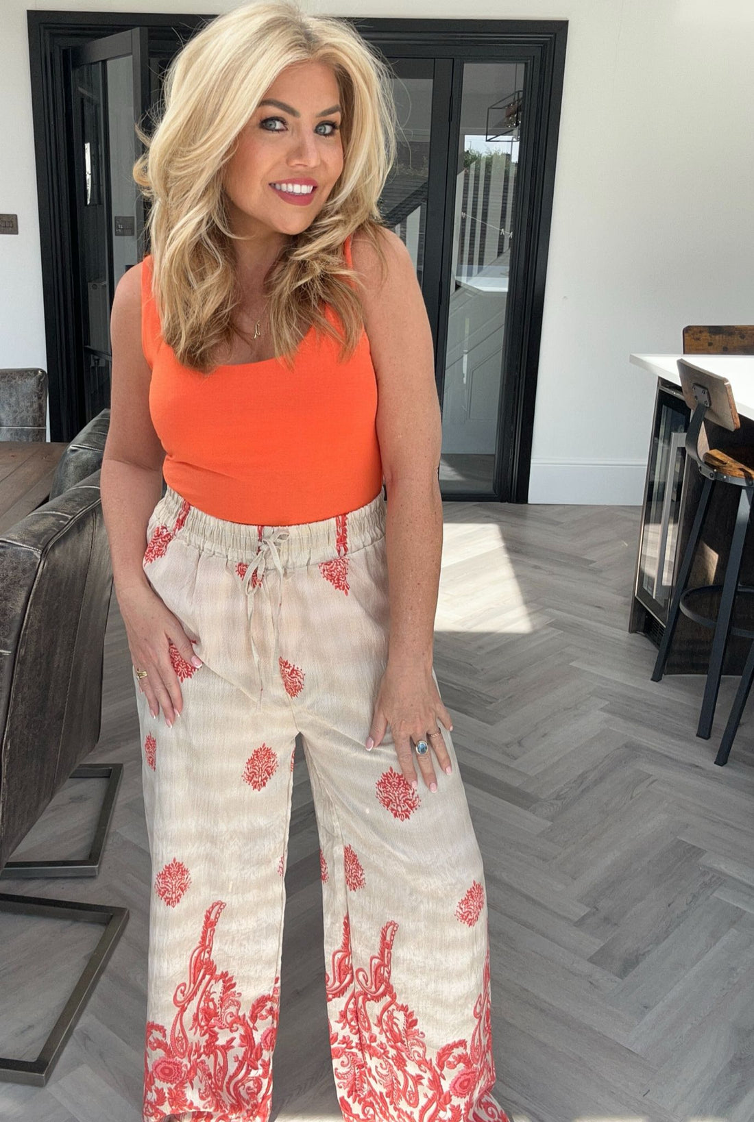 Carmen border print trousers and vest coord orange